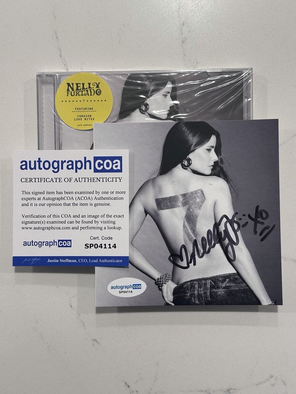 Nelly Furtado Signed - 7 CD + Signed Art Card (Love Bites) AUTOGRAPHED COA #6